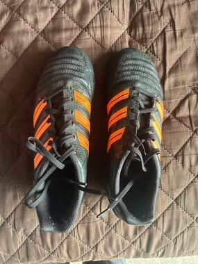 adidas Cleats Black with Orange Stripes